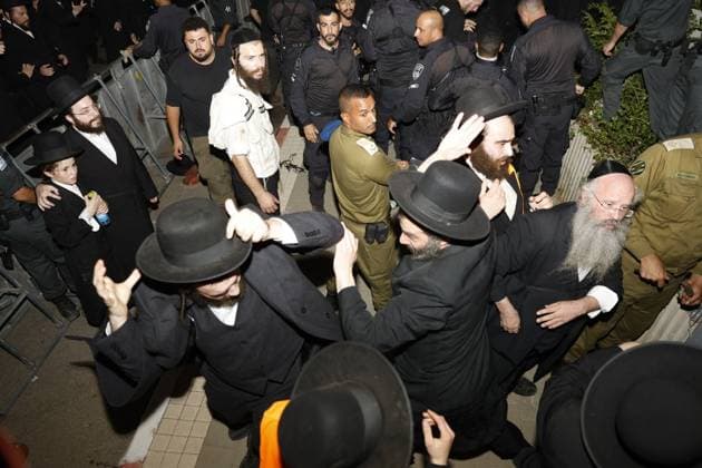 Ultra-Orthodox protesters demonstrate over arrest of alleged draft evader in Israel CFAR YONA, ISRAEL JULY 20, 2026: Ultra-Orthodox Jewish demonstrators, including members of the Gur Hasidic community, gather outside Military Prison 10 to protest the arrest of a Haredi man accused of evading compulsory military service. Organisers estimated that more than 20,000 people took part in the demonstration, which escalated into clashes and created hazardous conditions for journalists covering the event. Cfar Yona Israel Copyright: x xHilelxbenxorx xJNAxPressx