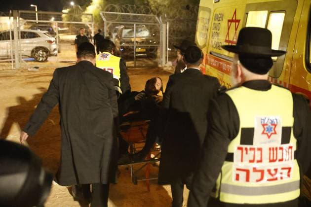 July 20, 2026, Cfar Yona, Israel: CFAR YONA, ISRAEL Ã¢â‚¬ JULY 20, 2026: Ultra-Orthodox Jewish demonstrators, including members of the Gur Hasidic community, gather outside Military Prison 10 to protest the arrest of a Haredi man accused of evading compulsory military service. Organisers estimated that more than 20,000 people took part in the demonstration, which escalated into clashes and created hazardous conditions for journalists covering the event. JNA Press Cfar Yona Israel  - ZUMAq101 20260720_zna_q101_240 Copyright: xHilelxBenxOrx
