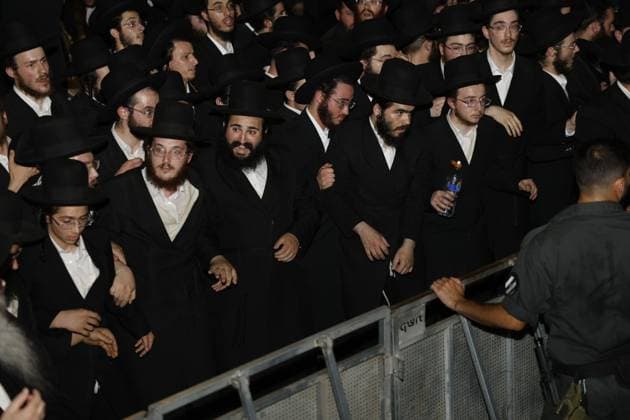 July 20, 2026, Cfar Yona, Israel: CFAR YONA, ISRAEL Ã¢â‚¬ JULY 20, 2026: Ultra-Orthodox Jewish demonstrators, including members of the Gur Hasidic community, gather outside Military Prison 10 to protest the arrest of a Haredi man accused of evading compulsory military service. Organisers estimated that more than 20,000 people took part in the demonstration, which escalated into clashes and created hazardous conditions for journalists covering the event. JNA Press Cfar Yona Israel - ZUMAq101 20260720_zna_q101_246 Copyright: xHilelxBenxOrx
