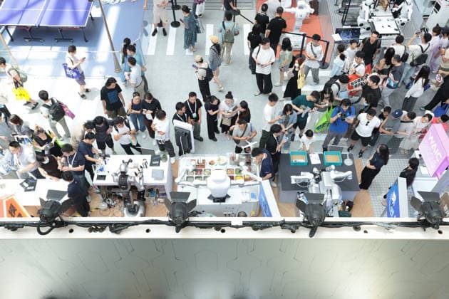 SHANGHAI, CHINA - JULY 20: People visit the exhibition area of the World Artificial Intelligence Conference on July 20, 2026 in Shanghai, China. The 2026 World AI Conference and High-Level Meeting on Global AI Governance scheduled from July 17 to July 20 showcases exhibitions of smart devices, AI plus culture and entertainment experiences, and a wide range of cutting-edge AI products, among which a range of humanoid robots and AI-powered dexterous hands as one of the highlights.  Copyright: xChinaxNewsxServicex 111655401740