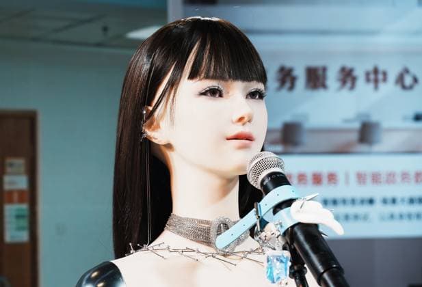 SHANGHAI, CHINA - JULY 20: A female robot sings on stage during the 2026 World AI Conference on July 20, 2026 in Shanghai, China. The conference showcases latest advancements in artificial intelligence and robotics technologies.  Copyright: xVCGx 111655410355