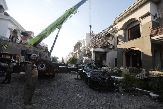 Massive explosion hits housing complex in Indonesia’s North Sumatra MEDAN, NORTH SUMATRA, INDONESIA - JULY 21: Police officers and a joint search-and-rescue team are at the scene in the Grand Polonia complex following a powerful explosion in Medan, North Sumatra, Indonesia, on July 21, 2026. The massive explosion, caused by a gas leak from an underground pipe, resulted in one fatality, left three people awaiting evacuation, and damaged five houses. Risky Cahyadi Anadolu Medan Indonesia. Editorial use only. Please get in touch for any other usage.  Copyright: x2026xAnadoluxRiskyxCahyadix