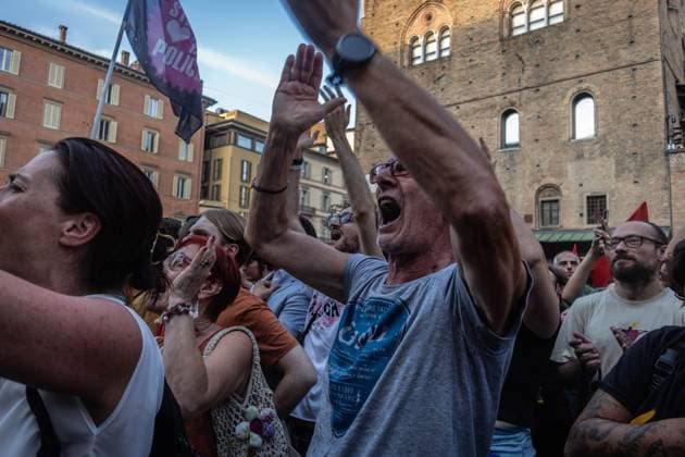 Thousands protest in Bologna over death of Abderrahim Fakir BOLOGNA, ITALY JULY 20, 2026: Thousands of people gather in Piazza del Nettuno in Bologna to demand justice for Abderrahim Fakir, a 43-year-old Italian-Moroccan man who died following a police intervention. Protesters accuse police of using excessive force during the arrest. The demonstration begins peacefully before groups of protesters move into nearby streets, where clashes erupt with riot police. Authorities deploy tear gas and water cannons as demonstrators throw stones and firecrackers during the confrontation. Bologna Italy Copyright: x xNadiaxCaimix xJNAxPressx