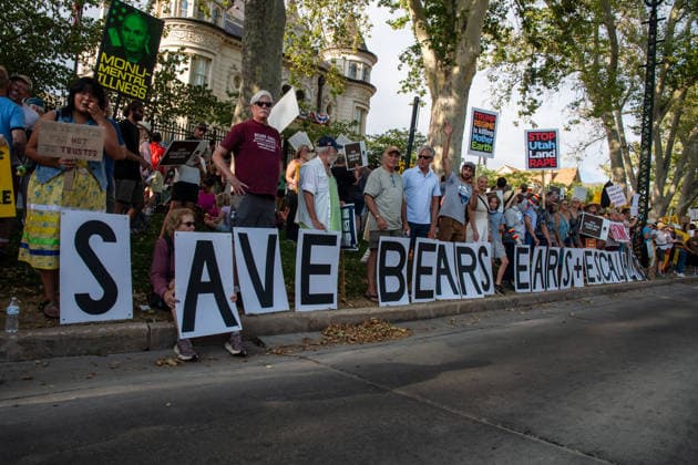 July 20, 2026, Salt Lake City, Utah, USA: Protesters line the sidewalk holding individual letters that spell out PROTECT OUR PUBLIC LANDS! outside the Utah Governor s Mansion in Salt Lake City, Utah, on Monday, July 20, 2026. The community rally was organized to protest executive actions drastically reducing the boundaries of the Bears Ears and Grand Staircase-Escalante national monuments. Salt Lake City USA  - ZUMAm292 20260720_znp_m292_005 Copyright: xCharlesxMcClintockxWilsonx