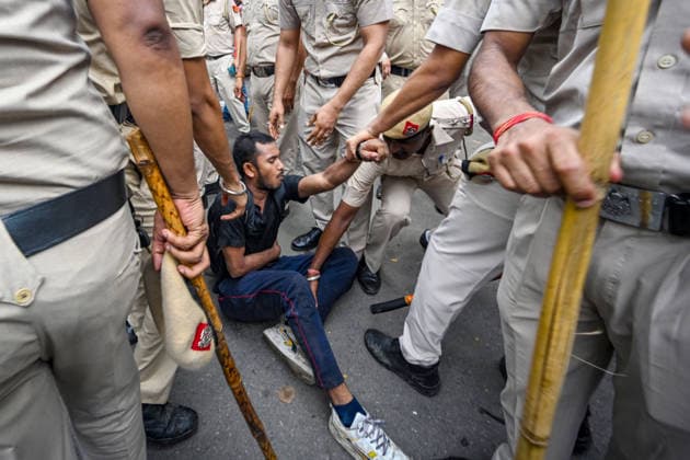 NEW DELHI, INDIA - JULY 20: Delhi Police personnel detain supporters of the CJP during a protest march near Parliament House on July 20, 2026 in New Delhi, India. (Photo by Raj K Raj Hindustan Times) Delhi Police Use Lathi Charge And Tear Gas Shells To Disperse CJP Supporters During Their March To Parliament