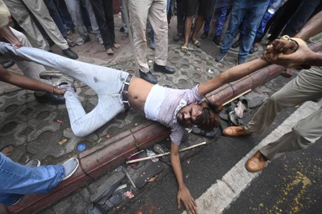NEW DELHI, INDIA - JULY 20: Delhi Police personnel detain supporters of the CJP during a protest march near Parliament House on July 20, 2026 in New Delhi, India. (Photo by Raj K Raj Hindustan Times) Delhi Police Detain Protestors During CJP March Towards Parliament