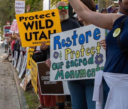 July 20, 2026, Salt Lake City, Utah, USA: Demonstrators hold signs during a protest outside the Utah Governor s Mansion in Salt Lake City, Utah, on Monday, July 20, 2026. The community rally was organized to protest executive actions drastically reducing the boundaries of the Bears Ears and Grand Staircase-Escalante national monuments. Salt Lake City USA  - ZUMAm292 20260720_znp_m292_008 Copyright: xCharlesxMcClintockxWilsonx