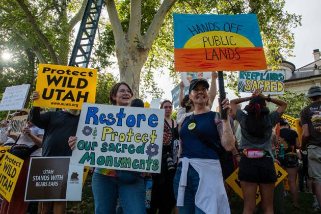 July 20, 2026, Salt Lake City, Utah, USA: Demonstrators hold signs during a protest outside the Utah Governor s Mansion in Salt Lake City, Utah, on Monday, July 20, 2026. The community rally was organized to protest executive actions drastically reducing the boundaries of the Bears Ears and Grand Staircase-Escalante national monuments. Salt Lake City USA  - ZUMAm292 20260720_znp_m292_009 Copyright: xCharlesxMcClintockxWilsonx