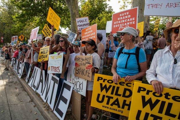 July 20, 2026, Salt Lake City, Utah, USA: Demonstrators hold signs during a protest outside the Utah Governor s Mansion in Salt Lake City, Utah, on Monday, July 20, 2026. The community rally was organized to protest executive actions drastically reducing the boundaries of the Bears Ears and Grand Staircase-Escalante national monuments. Salt Lake City USA  - ZUMAm292 20260720_znp_m292_021 Copyright: xCharlesxMcClintockxWilsonx