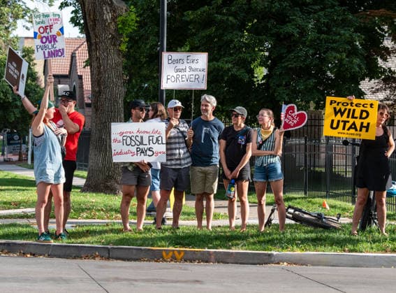 July 20, 2026, Salt Lake City, Utah, USA: Demonstrators hold signs during a protest outside the Utah Governor s Mansion in Salt Lake City, Utah, on Monday, July 20, 2026. The community rally was organized to protest executive actions drastically reducing the boundaries of the Bears Ears and Grand Staircase-Escalante national monuments. Salt Lake City USA  - ZUMAm292 20260720_znp_m292_023 Copyright: xCharlesxMcClintockxWilsonx