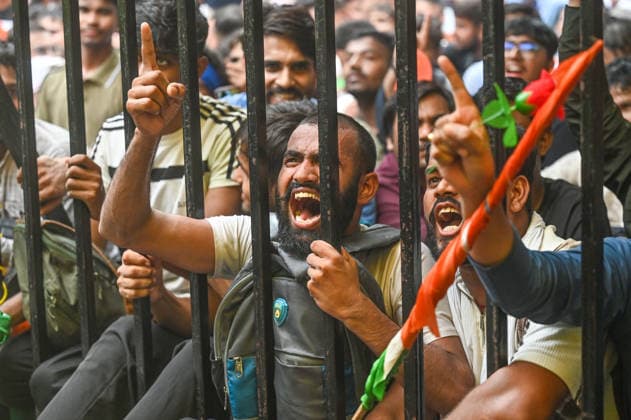 NEW DELHI, INDIA - JULY 20: Massive crowds of protesters arrives to march towards Parliament from Jantar Mantar on July 20, 2026 in New Delhi, India. Protesters were seen pushing through police barricades and scuffling with security personnel as authorities attempted to stop the march. The demonstration, organized by the Cockroach Janta Party (CJP), drew thousands of supporters demanding action over alleged examination paper leaks and reforms in the education system. (Photo by Sanchit Khanna Hindustan Times) Cockroach Janata Party Protest March To Parliament