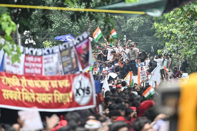 NEW DELHI, INDIA - JULY 20: Massive crowds of protesters arrives to march towards Parliament from Jantar Mantar on July 20, 2026 in New Delhi, India. Protesters were seen pushing through police barricades and scuffling with security personnel as authorities attempted to stop the march. The demonstration, organized by the Cockroach Janta Party (CJP), drew thousands of supporters demanding action over alleged examination paper leaks and reforms in the education system. (Photo by Sanchit Khanna Hindustan Times) Cockroach Janata Party Protest March To Parliament