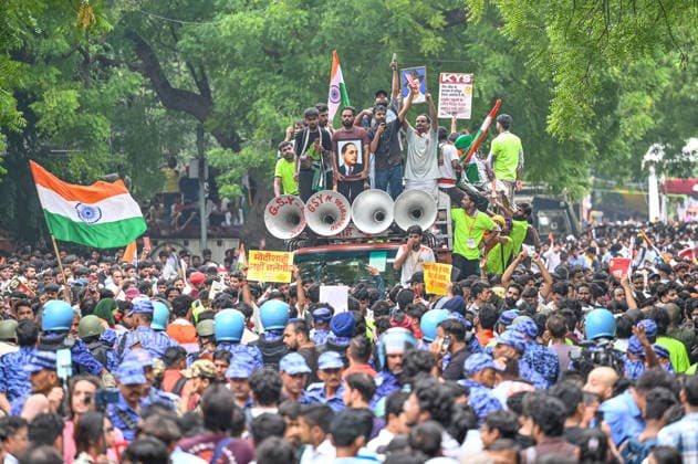 NEW DELHI, INDIA - JULY 20: Abhijeet Dipke, founder of the Cockroach Janta Party (CJP), participates in a protest march towards Parliament from Jantar Mantar on July 20, 2026 in New Delhi, India. The march, held amid heavy security arrangements, drew thousands of supporters demanding action over alleged examination paper leaks and reforms in the education system. (Photo by Sanchit Khanna Hindustan Times) Cockroach Janata Party Protest March To Parliament