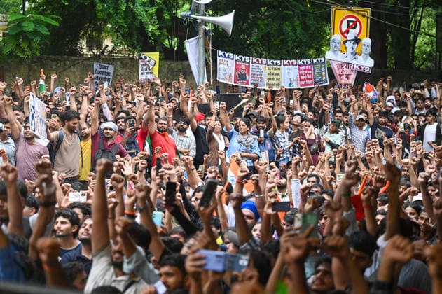 NEW DELHI, INDIA - JULY 20: Massive crowds of protesters arrives to march towards Parliament from Jantar Mantar on July 20, 2026 in New Delhi, India. Protesters were seen pushing through police barricades and scuffling with security personnel as authorities attempted to stop the march. The demonstration, organized by the Cockroach Janta Party (CJP), drew thousands of supporters demanding action over alleged examination paper leaks and reforms in the education system. (Photo by Sanchit Khanna Hindustan Times) Cockroach Janata Party Protest March To Parliament
