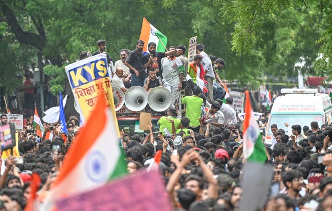 NEW DELHI, INDIA - JULY 20: Abhijeet Dipke, founder of the Cockroach Janta Party (CJP), participates in a protest march towards Parliament from Jantar Mantar on July 20, 2026 in New Delhi, India. The march, held amid heavy security arrangements, drew thousands of supporters demanding action over alleged examination paper leaks and reforms in the education system. (Photo by Sanchit Khanna Hindustan Times) Cockroach Janata Party Protest March To Parliament