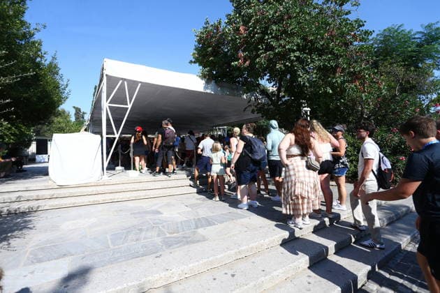 July 21, 2026, Athens, Greece: Police officers secure the area near the entrance to the Acropolis archaeological site in Athens, Greece, after a man allegedly stabbed two American tourists. The two injured visitors received medical treatment, while the suspect was detained by authorities. An investigation into the incident is ongoing. Athens Greece  - ZUMAv62_ 20260721_zaf_v62_001 Copyright: xAristidisxVafeiadakisx