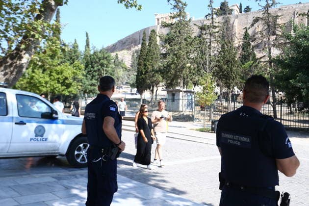 July 21, 2026, Athens, Greece: Police officers secure the area near the entrance to the Acropolis archaeological site in Athens, Greece, after a man allegedly stabbed two American tourists. The two injured visitors received medical treatment, while the suspect was detained by authorities. An investigation into the incident is ongoing. Athens Greece  - ZUMAv62_ 20260721_zaf_v62_008 Copyright: xAristidisxVafeiadakisx