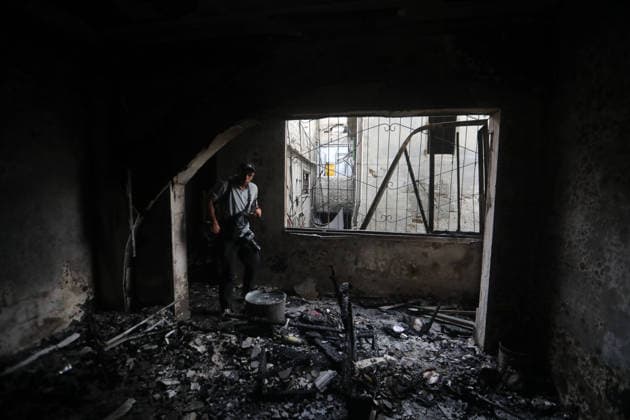 Palestinians inspect site of deadly strike on family home in Gaza City Palestinians inspect the site of an Israeli airstrike that targeted a house belonging to the al-Masri family on al-Thalathini Street in Gaza City, on July 21, 2026. Medical sources said the strike killed Firas al-Masri, his wife, and their four children. Photo by Bilal Osama apaimages Gaza city Gaza Strip Palestinian Territory 210726_Gaza_BO_00(16) Copyright: xapaimagesxBilalxOsamax xapaimagesx