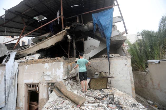 Palestinians inspect site of deadly strike on family home in Gaza City Palestinians inspect the site of an Israeli airstrike that targeted a house belonging to the al-Masri family on al-Thalathini Street in Gaza City, on July 21, 2026. Medical sources said the strike killed Firas al-Masri, his wife, and their four children. Photo by Bilal Osama apaimages Gaza city Gaza Strip Palestinian Territory 210726_Gaza_BO_00(28) Copyright: xapaimagesxBilalxOsamax xapaimagesx