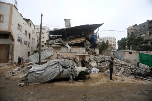 Palestinians inspect site of deadly strike on family home in Gaza City Palestinians inspect the site of an Israeli airstrike that targeted a house belonging to the al-Masri family on al-Thalathini Street in Gaza City, on July 21, 2026. Medical sources said the strike killed Firas al-Masri, his wife, and their four children. Photo by Bilal Osama apaimages Gaza city Gaza Strip Palestinian Territory 210726_Gaza_BO_00(8) Copyright: xapaimagesxBilalxOsamax xapaimagesx