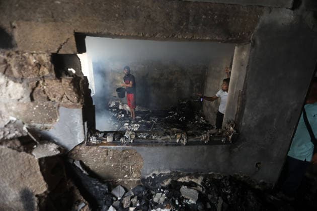 Palestinians inspect site of deadly strike on family home in Gaza City Palestinians inspect the site of an Israeli airstrike that targeted a house belonging to the al-Masri family on al-Thalathini Street in Gaza City, on July 21, 2026. Medical sources said the strike killed Firas al-Masri, his wife, and their four children. Photo by Bilal Osama apaimages Gaza city Gaza Strip Palestinian Territory 210726_Gaza_BO_00(22) Copyright: xapaimagesxBilalxOsamax xapaimagesx