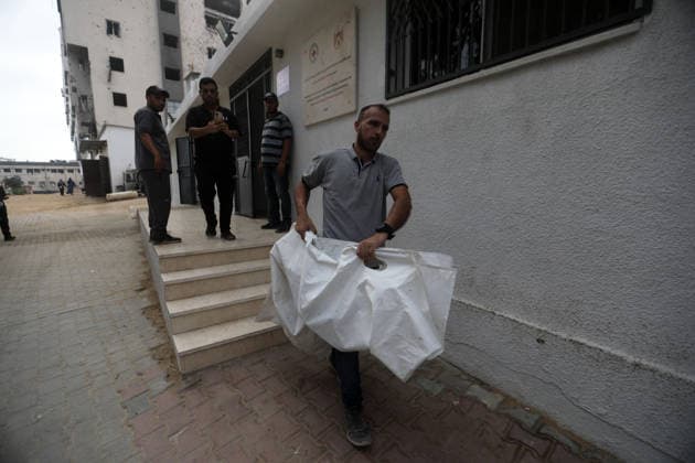 Mourners bid farewell to six members of al-Masri family Mourners bid farewell to the bodies of Firas al-Masri, his wife, and their four children after they were killed in an Israeli airstrike that targeted a house belonging to the al-Masri family on al-Thalathini Street in Gaza City, on July 21, 2026. Photo by Bilal Osama apaimages Gaza city Gaza Strip Palestinian Territory 210726_Gaza_BO_01(33) Copyright: xapaimagesxBilalxOsamax xapaimagesx