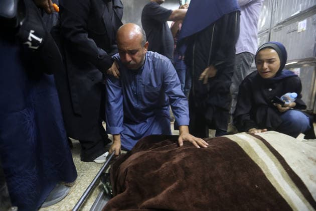 Mourners bid farewell to six members of al-Masri family Mourners bid farewell to the bodies of Firas al-Masri, his wife, and their four children after they were killed in an Israeli airstrike that targeted a house belonging to the al-Masri family on al-Thalathini Street in Gaza City, on July 21, 2026. Photo by Bilal Osama apaimages Gaza city Gaza Strip Palestinian Territory 210726_Gaza_BO_01(38) Copyright: xapaimagesxBilalxOsamax xapaimagesx