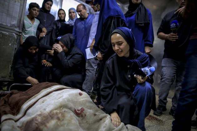 Funeral process for six Palestinians died in Israeli attack in Gaza GAZA CITY, GAZA, PALESTINE - JULY 21: Relatives of Palestinians, who lost their lives following the Israeli attack on a home belonging to the al-Misri family on al-Selasin Street, mourn as the bodies are taken from al-Shifa Hospital for funeral process in Gaza City, Gaza, Palestine on July 21, 2026. Saeed M. M. T. Jaras Anadolu Gaza City Gaza. Editorial use only. Please get in touch for any other usage.  Copyright: x2026xAnadoluxSaeedxM.xM.xT.xJarasx