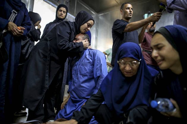 Funeral process for six Palestinians died in Israeli attack in Gaza GAZA CITY, GAZA, PALESTINE - JULY 21: Relatives of Palestinians, who lost their lives following the Israeli attack on a home belonging to the al-Misri family on al-Selasin Street, mourn as the bodies are taken from al-Shifa Hospital for funeral process in Gaza City, Gaza, Palestine on July 21, 2026. Saeed M. M. T. Jaras Anadolu Gaza City Gaza. Editorial use only. Please get in touch for any other usage.  Copyright: x2026xAnadoluxSaeedxM.xM.xT.xJarasx