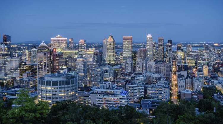 Montreal Canada Skyline from Mount Royal with Downtown Cityscape Day to Night Montreal Canada Skyline from Mount Royal with Downtown Cityscape Day to Night Copyright: imageBROKER AlexxGrichenko ibxiqx18478096.jpg