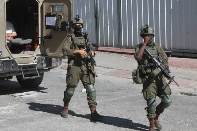 Israeli forces demolish Palestinian home east of Hebron Israeli bulldozers demolish a two-story house belonging to Fouad Jaradat in the Wadi al-Sharakh area of Sa ir, east of Hebron in the occupied West Bank, as Israeli forces deploy in the area and Palestinians inspect the site, on July 21, 2026. Israeli authorities said the house was built without a permit. Photo by Mamoun Wazwaz Hebron West Bank Palestinian Territory 210726_Hebron_MW_00(4) Copyright: xapaimagesxMamounxWazwazx xapaimagesx