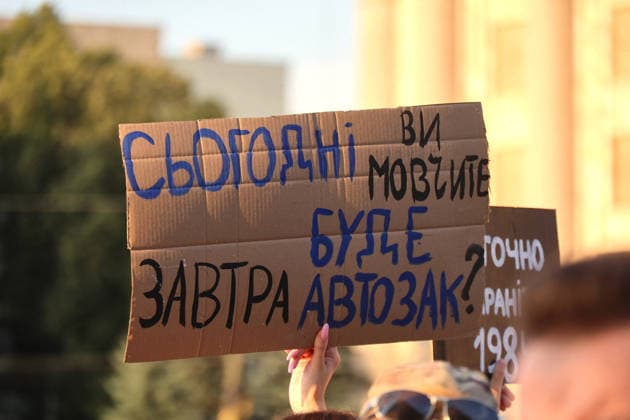 Protest Against Dismissal of Mykhailo Fedorov Enters Fifth Day - Kharkiv A demonstrator holds a placard reading Today You Stay Silent, Tomorrow Prison Bus Will Come as activists protest against the dismissal of Mykhailo Fedorov from the post of the Defence Minister of Ukraine and demand the resignation of Commander-in-Chief of the Armed Forces Oleksandr Syrskyi, Kharkiv, Ukraine, July 20, 2026. Photo by Viacheslav Madiievskyi Ukrinform ABACAPRESS.COM Kharkiv Ukraine  Copyright: xMadiyevskyyxVyacheslav Ukrinformx