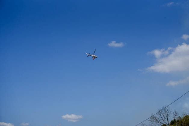Wildfire Near Lisbon A firefighting helicopter drops water over a wildfire near Lisbon, Portugal, on July 21, 2026, as emergency crews work to contain the blaze amid high temperatures and dry conditions. Lisbon Portugal  Copyright: xLuisxBozax originalFilename: boza-notitle260721_npofV.jpg