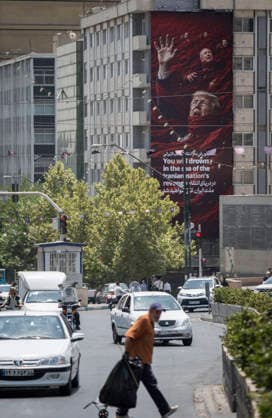 Anti‘Trump Messaging Appears On Billboards In Tehran Vehicles move beneath an anti-U.S.-Israeli billboard in downtown Tehran, Iran, on July 21, 2026, amid renewed conflicts between Iran and the United States in southern Iran. MORTEZA NIKOUBAZL NurPhoto Tehran Tehran Iran  Copyright: xMortezaxNikoubazlx originalFilename: nikoubazl-antitrum260721_npeOu.jpg
