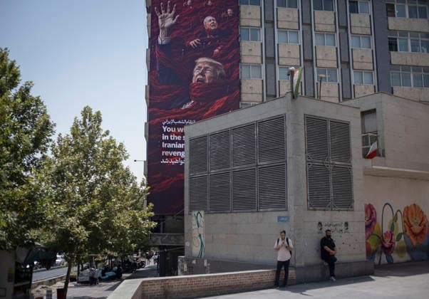 Anti‘Trump Messaging Appears On Billboards In Tehran Two Iranian men stand beneath an anti-U.S.-Israeli billboard in downtown Tehran, Iran, on July 21, 2026, amid renewed conflicts between Iran and the United States in southern Iran. MORTEZA NIKOUBAZL NurPhoto Tehran Tehran Iran  Copyright: xMortezaxNikoubazlx originalFilename: nikoubazl-antitrum260721_nptlE.jpg