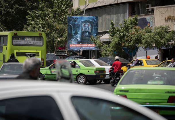 Anti‘Trump Messaging Appears On Billboards In Tehran A billboard depicting a gravestone with a portrait of American Senator Lindsey Olin Graham is photographed on a street-side in downtown Tehran, Iran, on July 21, 2026, amid renewed conflicts between Iran and the United States in southern Iran. MORTEZA NIKOUBAZL NurPhoto Tehran Tehran Iran  Copyright: xMortezaxNikoubazlx originalFilename: nikoubazl-antitrum260721_npZ1U.jpg