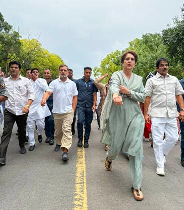 RECORD DATE NOT STATED Congress leaders stage a foot march towards Prime Minister s residence New Delhi, Jul 21 (ANI): Lok Sabha LoP Rahul Gandhi, with Congress leaders Priyanka Gandhi Vadra, KC Venugopal, and others, stages a foot march towards Prime Minister s residence at Lok Kalyan Marg, demanding the resignations of Prime Minister Narendra Modi and Education Minister Dharmendra Pradhan, in New Delhi on Tuesday. (AICC ANI Photo) New Delhi Delhi India Copyright: xANIx ANI_20260721428