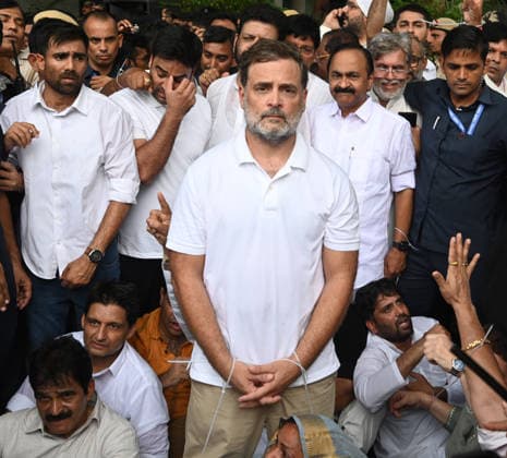 NEW DELHI, INDIA - JULY 21: Leader of Opposition in the Lok Sabha Rahul Gandhi and others, stages a sit-in protest near the Prime Minister s residence in solidarity with students protesting over alleged irregularities in the NEET examination, on July 21, 2026 in New Delhi, India. The spontaneous demonstration at Lok Kalyan Marg unfolded a day after security forces used tear gas and lathi charges to disperse student marchers led by the Cockroach Janata Party (CJP) near Parliament Street. Rahul Gandhi demanded the immediate resignation of Union Education Minister Dharmendra Pradhan and an urgent, dedicated debate in Parliament regarding the NEET paper leak controversy. (Photo by Sonu Mehta Hindustan Times) LoP Lok Sabha Rahul Gandhi Stages