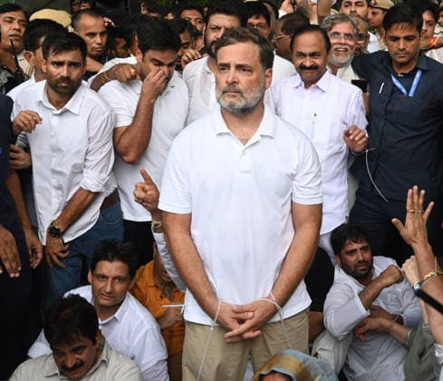 NEW DELHI, INDIA - JULY 21: Leader of Opposition in the Lok Sabha Rahul Gandhi and others, stages a sit-in protest near the Prime Minister s residence in solidarity with students protesting over alleged irregularities in the NEET examination, on July 21, 2026 in New Delhi, India. The spontaneous demonstration at Lok Kalyan Marg unfolded a day after security forces used tear gas and lathi charges to disperse student marchers led by the Cockroach Janata Party (CJP) near Parliament Street. Rahul Gandhi demanded the immediate resignation of Union Education Minister Dharmendra Pradhan and an urgent, dedicated debate in Parliament regarding the NEET paper leak controversy. (Photo by Sonu Mehta Hindustan Times) LoP Lok Sabha Rahul Gandhi Stages