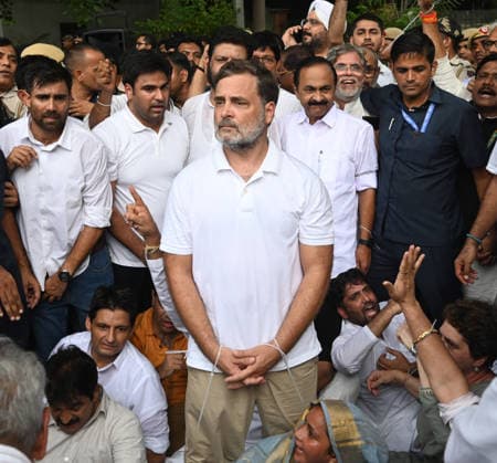 NEW DELHI, INDIA - JULY 21: Leader of Opposition in the Lok Sabha Rahul Gandhi and others, stages a sit-in protest near the Prime Minister s residence in solidarity with students protesting over alleged irregularities in the NEET examination, on July 21, 2026 in New Delhi, India. The spontaneous demonstration at Lok Kalyan Marg unfolded a day after security forces used tear gas and lathi charges to disperse student marchers led by the Cockroach Janata Party (CJP) near Parliament Street. Rahul Gandhi demanded the immediate resignation of Union Education Minister Dharmendra Pradhan and an urgent, dedicated debate in Parliament regarding the NEET paper leak controversy. (Photo by Sonu Mehta Hindustan Times) LoP Lok Sabha Rahul Gandhi Stages