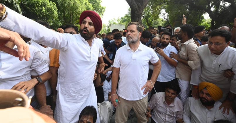 NEW DELHI, INDIA - JULY 21: Leader of Opposition in the Lok Sabha Rahul Gandhi and others, stages a sit-in protest near the Prime Minister s residence in solidarity with students protesting over alleged irregularities in the NEET examination, on July 21, 2026 in New Delhi, India. The spontaneous demonstration at Lok Kalyan Marg unfolded a day after security forces used tear gas and lathi charges to disperse student marchers led by the Cockroach Janata Party (CJP) near Parliament Street. Rahul Gandhi demanded the immediate resignation of Union Education Minister Dharmendra Pradhan and an urgent, dedicated debate in Parliament regarding the NEET paper leak controversy. (Photo by Sonu Mehta Hindustan Times) LoP Lok Sabha Rahul Gandhi Stages
