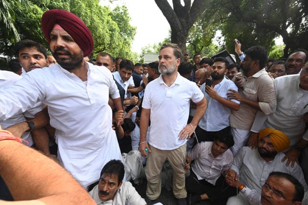 NEW DELHI, INDIA - JULY 21: Leader of Opposition in the Lok Sabha Rahul Gandhi and others, stages a sit-in protest near the Prime Minister s residence in solidarity with students protesting over alleged irregularities in the NEET examination, on July 21, 2026 in New Delhi, India. The spontaneous demonstration at Lok Kalyan Marg unfolded a day after security forces used tear gas and lathi charges to disperse student marchers led by the Cockroach Janata Party (CJP) near Parliament Street. Rahul Gandhi demanded the immediate resignation of Union Education Minister Dharmendra Pradhan and an urgent, dedicated debate in Parliament regarding the NEET paper leak controversy. (Photo by Sonu Mehta Hindustan Times) LoP Lok Sabha Rahul Gandhi Stages