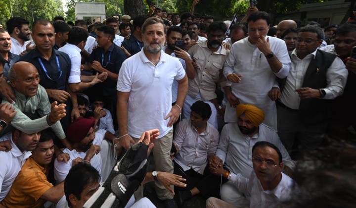 NEW DELHI, INDIA - JULY 21: Leader of Opposition in the Lok Sabha Rahul Gandhi and others, stages a sit-in protest near the Prime Minister s residence in solidarity with students protesting over alleged irregularities in the NEET examination, on July 21, 2026 in New Delhi, India. The spontaneous demonstration at Lok Kalyan Marg unfolded a day after security forces used tear gas and lathi charges to disperse student marchers led by the Cockroach Janata Party (CJP) near Parliament Street. Rahul Gandhi demanded the immediate resignation of Union Education Minister Dharmendra Pradhan and an urgent, dedicated debate in Parliament regarding the NEET paper leak controversy. (Photo by Sonu Mehta Hindustan Times) LoP Lok Sabha Rahul Gandhi Stages