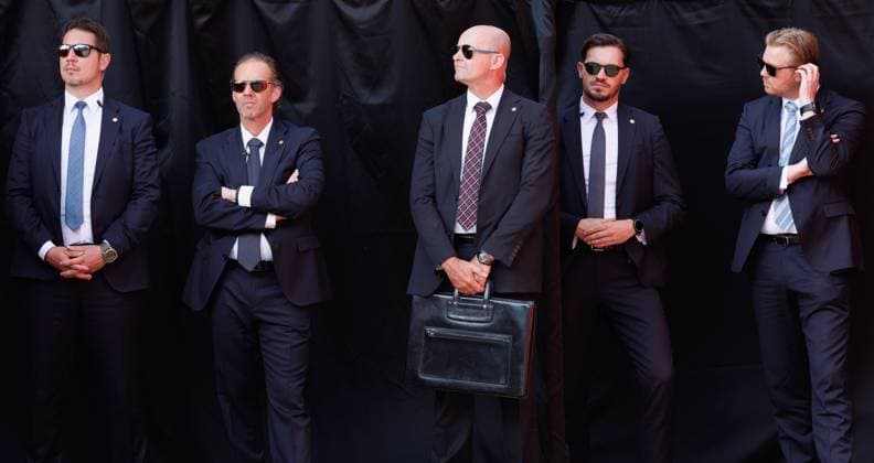 Royal s security staff members pictured during the military and civilian parade on the Belgian National Day, in Brussels, Tuesday 21 July 2026. This parade pays tribute to our Belgium s security and emergency services, such as the army, police, fire brigade or civil protection.  BENOITxDOPPAGNE 181691419