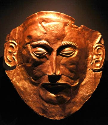 Timewalk London, UK. Copy of the mask of Agamemnon, an ancient artifact created in around 1500 BC. Timewalk is a brand-new immersive journey through ancient eras, this new exhibition is a first-of-its-kind historical presentation in the UK, from the award-winning team at DEM Museums. Through dazzling visual effects, cutting-edge technology, roaring soundscapes and enthralling narration, the experience tells the story of the rise and fall of historic human civilisations. Utilising over 160 projectors and 100 light displays, visitors will be transported to experience firsthand how it would have felt to inhabit these bygone societies, from sailing the Nile and passing through the ancient city gates of Babylon, to exploring the ancient wor 