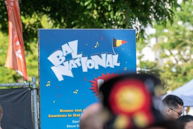 The Bal National logo is seen at the Everyone to the Table initiative by Resto National at Vossenplein - Place du Jeu de Balle, as part of the National Holiday, on Tuesday 21 July 2026 in Brussels.  JONASxROOSENS 181694901