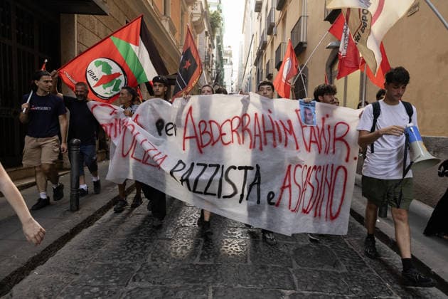 Demonstration in Naples to demand justice and truth after the death of Abderrahim Fakir NAPLES, ITALY - JULY 21: People gather during a demonstration to demand justice and truth for Abderrahim Fakir who died in circumstances yet to be clarified on Naples, Italy on July 21, 2026. Abderrahim Fakir, a 42-year-old man of Moroccan origin, died after being stopped and then pinned to the ground by two police officers on July 19, 2026 in Bologna. In a video, he can be heard screaming, Help, enough! . Iso Ekle Anadolu Naples Italy. Editorial use only. Please get in touch for any other usage.  Copyright: x2026xAnadoluxIsoxEklex