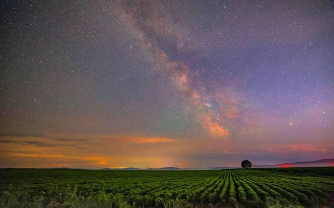 News Bilder des Tages #2 (260722) -- BEIJING, July 22, 2026 -- This photo taken on July 19, 2026 shows the Milky Way above Yichun, northeast China s Heilongjiang Province. (Photo by Xinhua) XINHUA PHOTOS OF THE DAY LixJiaxing 