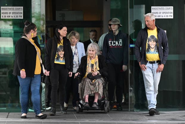ANNETTE MASON DEATH INQUEST, Judith Anderson (in wheelchair), mother of victim Annette Mason is seen with family members at the inquest into the 1989 murder of teen girl Annette Mason at the Brisbane Magistrate s Court in Brisbane, Wednesday, July 22, 2026. ( NO ARCHIVING BRISBANE QUEENSLAND AUSTRALIA  Copyright: xDARRENxENGLANDx 20260722154777095135