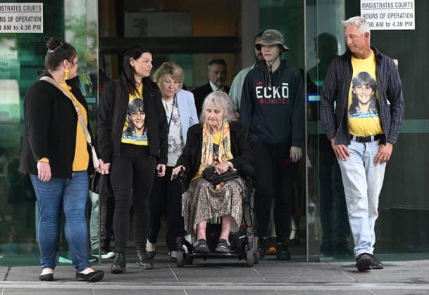 ANNETTE MASON DEATH INQUEST, Judith Anderson (in wheelchair), mother of victim Annette Mason is seen with family members at the inquest into the 1989 murder of teen girl Annette Mason at the Brisbane Magistrate s Court in Brisbane, Wednesday, July 22, 2026. ( NO ARCHIVING BRISBANE QUEENSLAND AUSTRALIA  Copyright: xDARRENxENGLANDx 20260722179393789480